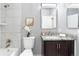Updated bathroom with modern fixtures and stylish granite countertops at 12666 Davis St, Broomfield, CO 80020