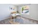 Inviting home office with a large window, white desk, and stylish decor at 12666 Davis St, Broomfield, CO 80020