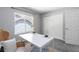 Bright office space with a white desk, closet, and natural light from the window at 12666 Davis St, Broomfield, CO 80020