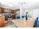 Open concept kitchen with stainless steel appliances, and adjacent dining area at 12666 Davis St, Broomfield, CO 80020
