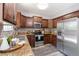 This spacious kitchen boasts stainless steel appliances and ample cabinet space at 12666 Davis St, Broomfield, CO 80020