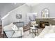 Bright living room with fireplace, hardwood floors and soaring ceilings at 12666 Davis St, Broomfield, CO 80020