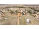 Aerial view of a neighborhood with lush, mature trees and sprawling acreage at 12579 Appaloosa Pl, Broomfield, CO 80020