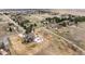 Aerial view of a luxurious estate with pool and gorgeous landscaping at 12579 Appaloosa Pl, Broomfield, CO 80020