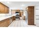 Spacious kitchen features ample cabinet space and stainless steel appliances at 12579 Appaloosa Pl, Broomfield, CO 80020