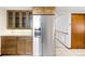 Updated kitchen features stainless steel refrigerator, wood cabinets and updated countertops at 12579 Appaloosa Pl, Broomfield, CO 80020