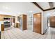 Spacious kitchen boasts stainless appliances, tile flooring, and easy access to the living areas at 12579 Appaloosa Pl, Broomfield, CO 80020