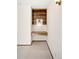 Corner office nook with a built-in desk, overhead lighting, and traditional wood shelving at 12579 Appaloosa Pl, Broomfield, CO 80020