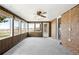 Inviting sun room with multiple windows and beautiful views of backyard at 12579 Appaloosa Pl, Broomfield, CO 80020