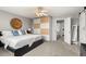 Cozy primary bedroom with an en-suite bathroom and closet at 4785 Aberdeen Ave, Highlands Ranch, CO 80126