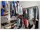Walk-in closet with ample hanging space and shelving at 4785 Aberdeen Ave, Highlands Ranch, CO 80126