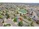 An aerial view of a home with mature trees and nearby neighborhood amenities at 5668 S Rifle Ct, Centennial, CO 80015