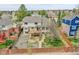 Aerial view of the backyard showcasing a gravel area, wooden fencing, and a partial view of home at 5668 S Rifle Ct, Centennial, CO 80015