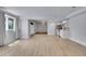 Finished basement with wood-look flooring and kitchenette at 5668 S Rifle Ct, Centennial, CO 80015