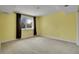 Bright bedroom with neutral carpet, large window, and simple design at 5668 S Rifle Ct, Centennial, CO 80015