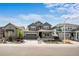 Charming two-story home with a covered porch and well-manicured landscaping at 8109 Mount Ouray Rd, Littleton, CO 80125