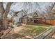 Spacious backyard and outdoor patio with home in the background at 1006 S Emerson St, Denver, CO 80209