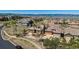 Neighborhood aerial view featuring a charming stone home with a well-manicured front yard at 10731 Featherwalk Ln, Highlands Ranch, CO 80126