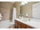 Well-lit bathroom with a shower-tub combo, modern vanity and decor at 10731 Featherwalk Ln, Highlands Ranch, CO 80126
