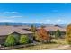 View of homes in the community with mountain views at 10731 Featherwalk Ln, Highlands Ranch, CO 80126