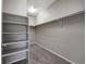 Spacious walk-in closet with built-in shelving and ample hanging space at 12210 Pine Post Dr, Parker, CO 80138