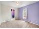 Cozy bedroom with carpet flooring and a window letting in plenty of natural light at 309 Lincoln Ave, Platteville, CO 80651