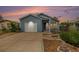 Charming home exterior featuring well-manicured landscaping and a driveway at 309 Lincoln Ave, Platteville, CO 80651
