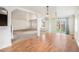 Bright, open-concept living area with hardwood floors, and lots of natural light at 309 Lincoln Ave, Platteville, CO 80651