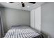 Comfortable carpeted bedroom offers a large closet and space for rest and relaxation at 1204 S Uvalda St, Aurora, CO 80012