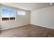 Bright bedroom with hardwood floors, recessed lighting, and great natural light at 1580 E 3Rd Ave, Longmont, CO 80501