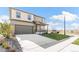Inviting two story home with a covered porch, two-car garage and a manicured lawn at 4338 Cattle Cross Trl, Castle Rock, CO 80104