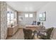 Well-lit home office with modern decor, a large window, and a functional workspace at 4338 Cattle Cross Trl, Castle Rock, CO 80104