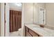 Bathroom featuring granite counters, updated fixtures, and a shower with curtain in neutral tones at 22268 E Hidden Trail Dr, Parker, CO 80138