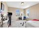 Cozy bedroom with natural light, a vanity desk, and ample space for personalization and creativity at 22268 E Hidden Trail Dr, Parker, CO 80138