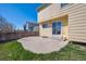Backyard featuring a concrete patio, lawn, and privacy fence, ideal for outdoor enjoyment and entertaining at 4965 Collinsville Pl, Highlands Ranch, CO 80130
