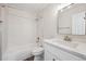 Clean bathroom featuring a shower and bathtub combination, a toilet, and a vanity sink at 4965 Collinsville Pl, Highlands Ranch, CO 80130