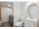 Convenient half-bathroom with washing machine and dryer at 4965 Collinsville Pl, Highlands Ranch, CO 80130