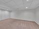 Finished basement with neutral carpet and closet at 5319 E Davies Dr, Centennial, CO 80122