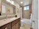Bathroom with a granite countertop, shower, tub, and decorative framed art at 5319 E Davies Dr, Centennial, CO 80122