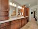 Bathroom boasting dual sink vanity with granite countertop, and custom cabinets at 5319 E Davies Dr, Centennial, CO 80122