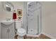 Bathroom featuring glass enclosed shower, a toilet, and a vanity at 5319 E Davies Dr, Centennial, CO 80122