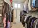 Walk-in closet featuring custom shelving and ample storage space at 5319 E Davies Dr, Centennial, CO 80122