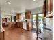 Bright kitchen featuring custom cabinets, granite counters and hardwood floors at 5319 E Davies Dr, Centennial, CO 80122