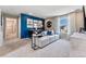 Spacious game room features gaming decor, a lounge area, and views of the neighborhood at 3297 N Duquesne Way, Aurora, CO 80019