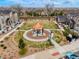 Aerial shot of a landscaped common area with a gazebo within a residential community at 15345 W 64Th Ln # 107, Arvada, CO 80007