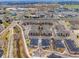 Aerial view showcases community's location near shopping and other amenities in a well planned neighborhood at 15345 W 64Th Ln # 107, Arvada, CO 80007