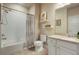 Well-lit bathroom featuring a shower-tub combination and a granite-topped vanity at 15345 W 64Th Ln # 107, Arvada, CO 80007