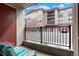 Relaxing patio area with seating and views of the surrounding neighborhood at 15345 W 64Th Ln # 107, Arvada, CO 80007