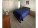 Comfortable bedroom with modern flooring, closet space, and a relaxing atmosphere at 12235 E 2Nd Dr, Aurora, CO 80011