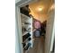 Walk-in closet equipped with shelving and hanging storage for organization at 12235 E 2Nd Dr, Aurora, CO 80011